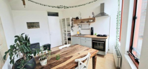 Light Apartment on top floor of 3 levels house